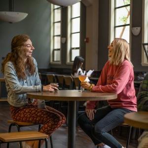 Students laugh between homework assignments